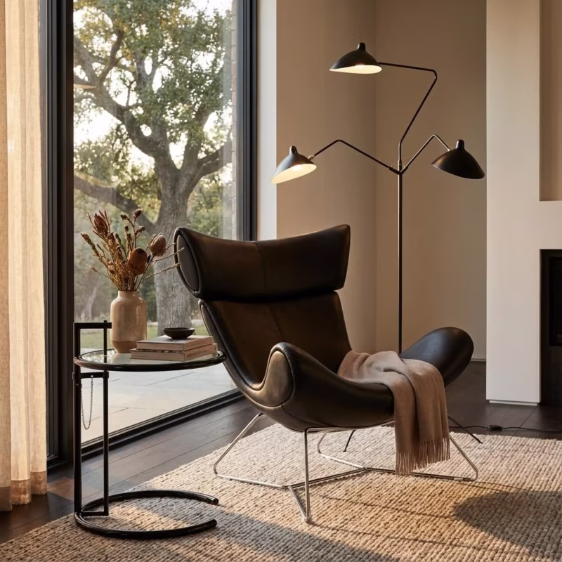 Sedia Emola in pelle italiana: poltrona moderna dal design pregiato